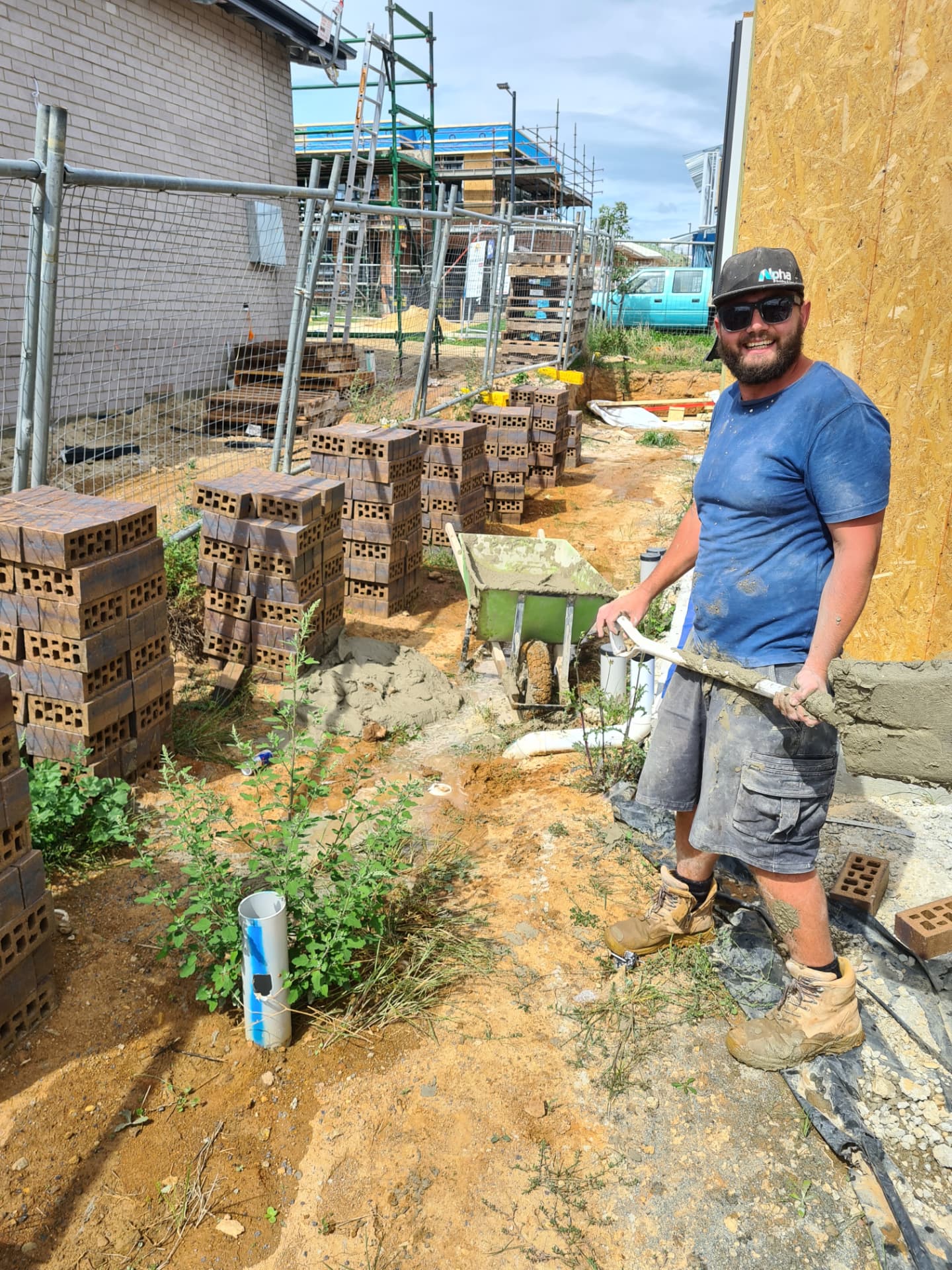 GDK bricklayer mixing mortar on a new home site in the Hunter Valley